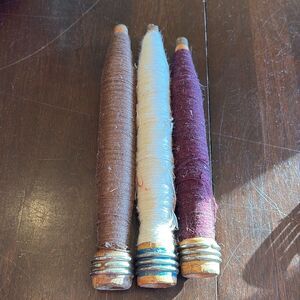 3 vintage primitive wood spools with thread